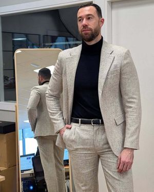 Beige Suit with Black Turtleneck