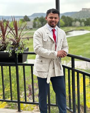 Belted Linen Blazer with Crimson Tie and Navy Trousers