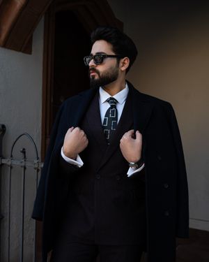 Black Overcoat with Double-Breasted Suit and Geometric Tie