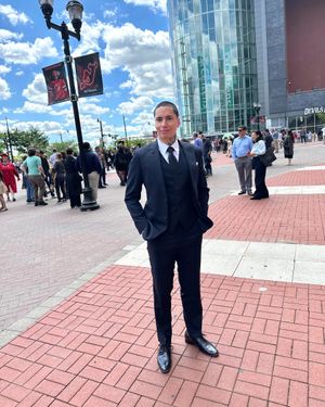 Dark Pinstriped Suit with White Shirt and Black Shoes