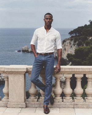 ivory-linen-shirt-blue-jeans-brown-loafers