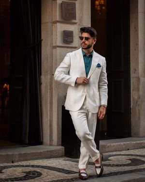 Ivory Linen Suit with Teal Shirt and Brown and White Loafers