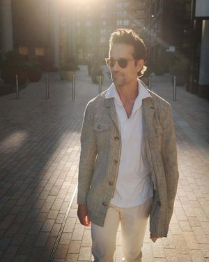 Linen Field Jacket with White Shirt and Cream Trousers