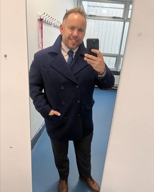 Navy Peacoat with Striped Shirt and Black Trousers