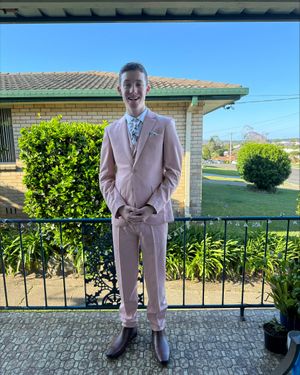 Soft Pink Three-Piece Suit with Brown Chelsea Boots