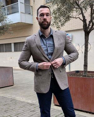 Textured Brown Blazer with Dark Jeans and Blue Shirt